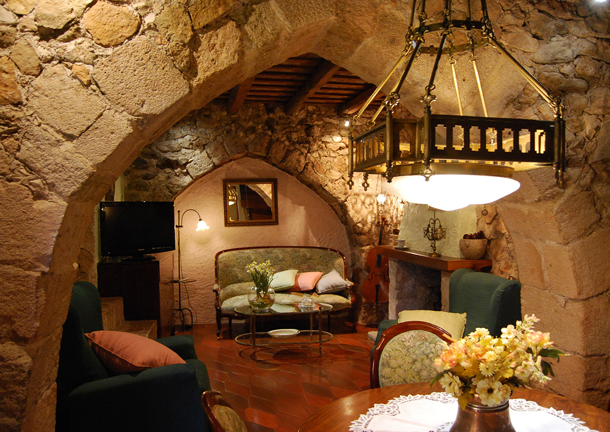 The room's Romanesque arches make the atmosphere unique